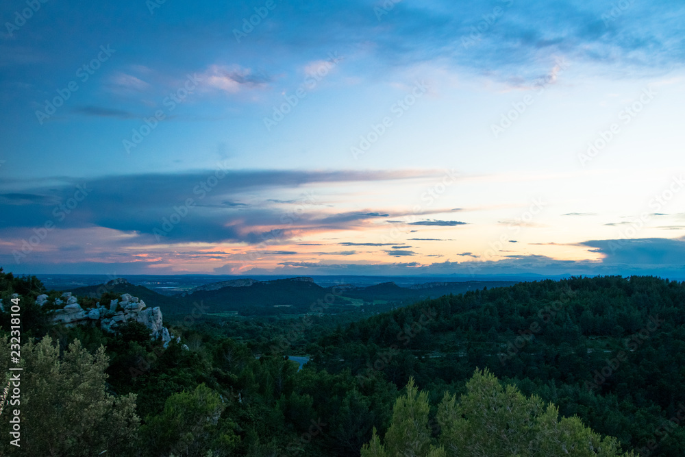 Sunset panorama of the Alpilles region near the village of Les-Baux-De-Provence, France