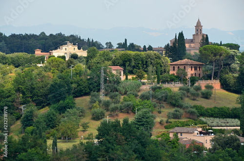 Views of the Tuscan countryside with historic buildings  View of historic buildings in Italy with cypress trees  Tuscany  landscape  outlook  nature  green  hiking  trees  environment  italy  houses  