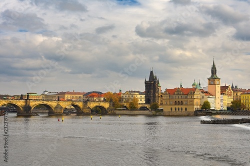 Prague, capital of the Czech Republic. Scenic view of the Old Town pier architecture and Charles Bridge over Vltava river.