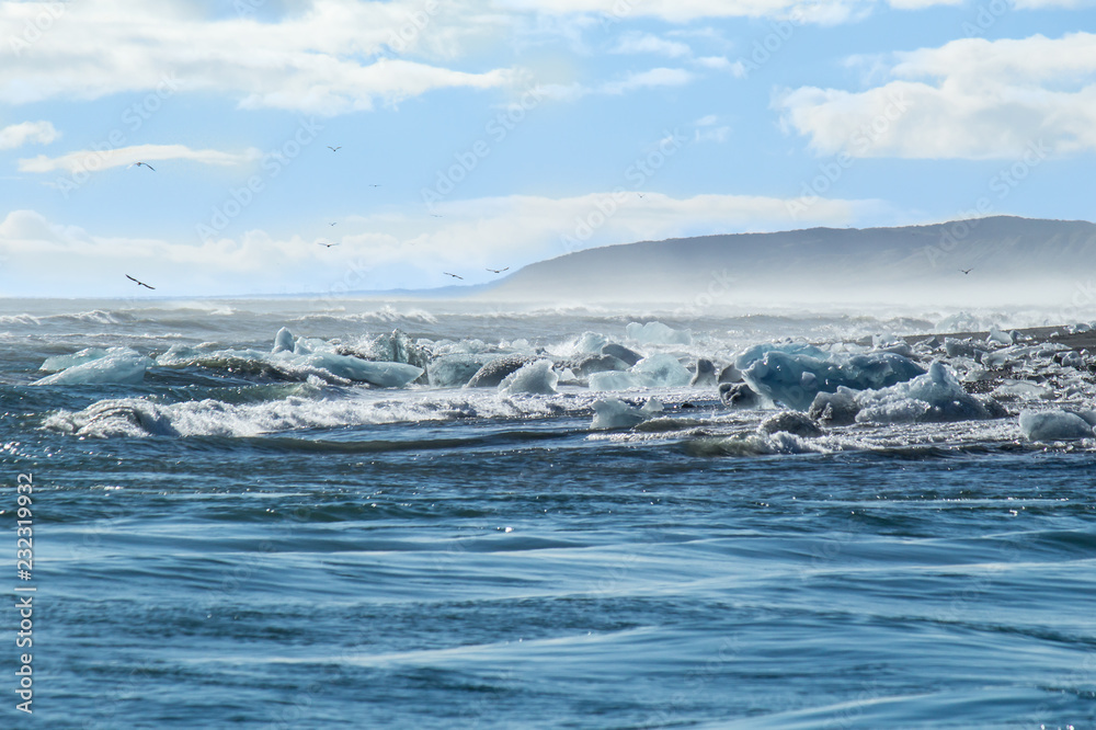 Coastline with icebergs and Ice lumps in mist_Iceland