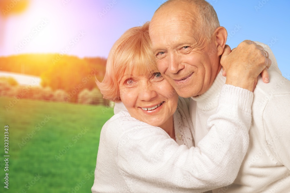 Portrait of happy senior couple smiling at home Portrait of happy senior couple smiling at home