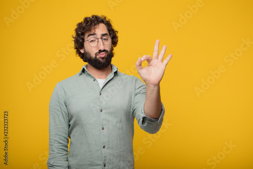 young bearded businessman expressing a concept photo