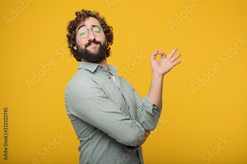 young bearded businessman expressing a concept photo