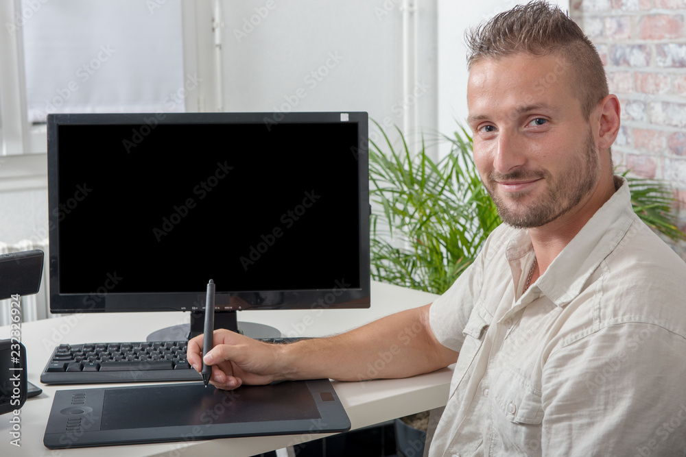 man video editor using graphic tablet man video editor using graphic tablet