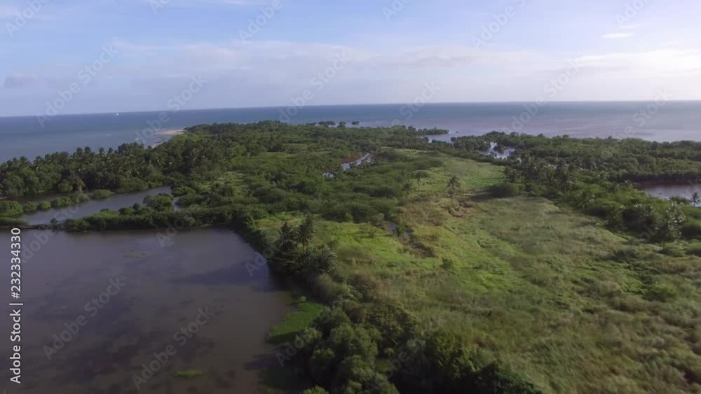 Dalahican, Lucena City, Philippines - December 28, 2017: Man made swamp and marsh land near the sea.Drone Aerial Dalahican, Lucena City, Philippines - December 28, 2017: Man made swamp and marsh land near the sea.Drone Aerial
