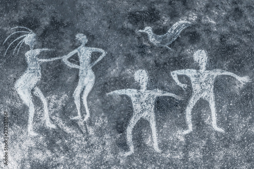 image of ancient people on the cave wall. ancient art, history of antiquities.