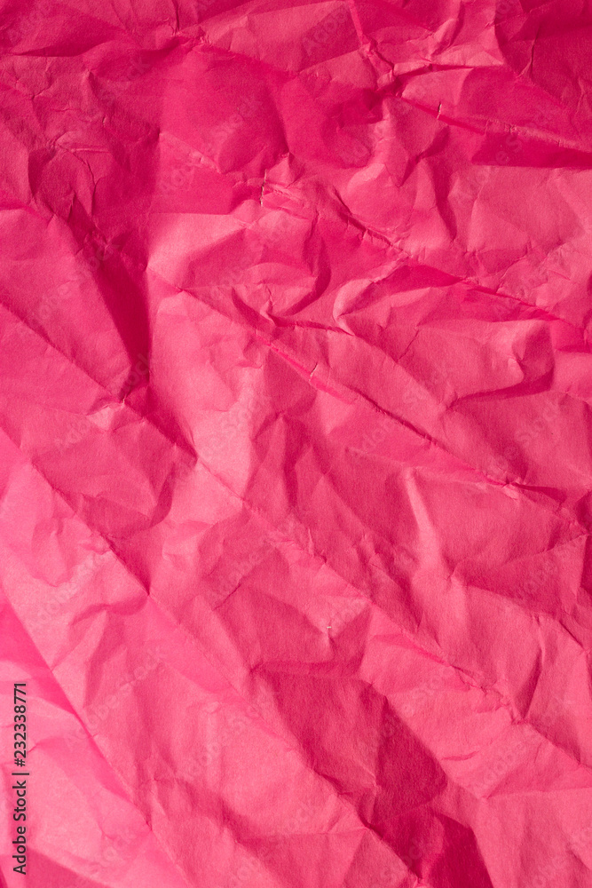 Crumpled red sheet of paper. Vertical background. Crumpled red sheet of paper. Vertical background.