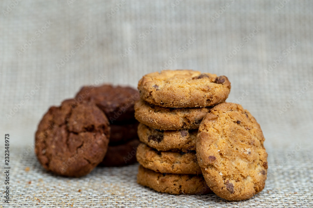 Several tasty cookies, whole or with drops of chocolate, in high resolution photography with quality. Photos of homemade cookies for dissemination Several tasty cookies, whole or with drops of chocolate, in high resolution photography with quality. Photos of homemade cookies for dissemination