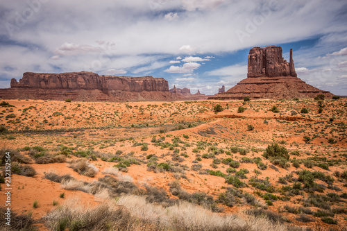 Monument Valley is located in both Arizona and Utah, and features giant red rock formations.