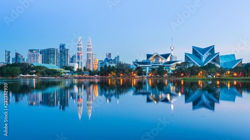 Day to Night Kuala Lumpur Cityscape  Of Malaysia 4K Time Lapse (tilt down)