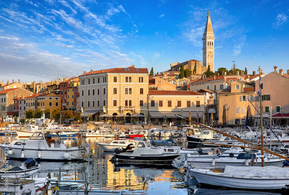 Rovinj, Croatia. Motorboats and boats on water in port
