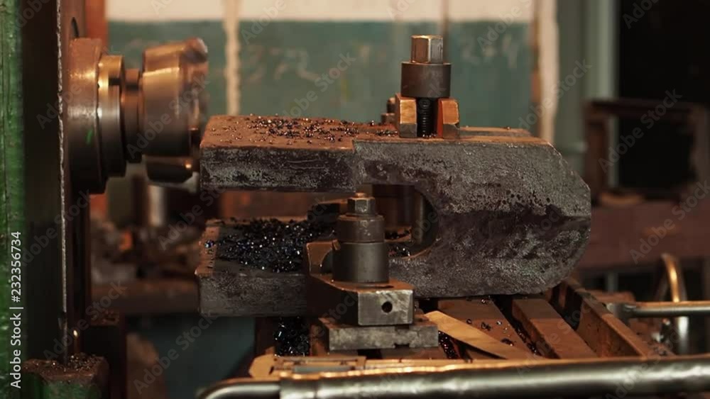 Process of production of a large metal detail. Working process on large production. In the shop of engineering plant. Close up. Process of production of a large metal detail. Working process on large production. In the shop of engineering plant. Close up.
