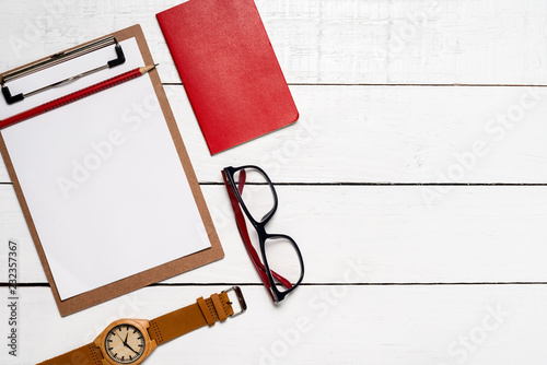 Top view of work objects on the rustic wooden background with copy space for insertion of your mensage or design elements. photo