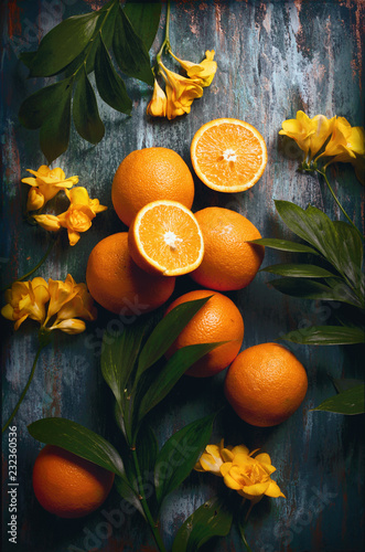 flatlay food background - empty wooden board with mint oranges and knife, with copy space