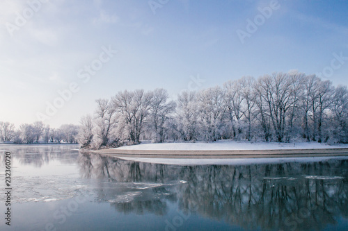winter landscape with river and trees © Ирина Попова