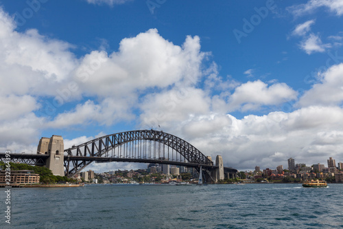 Harbor city with downtown skyscraper in business district Sydney with bridge © Tjeerd