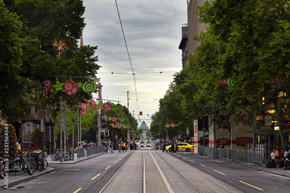 Naklejka premium Melbourne cityscape and tram. Melbourne has the largest urban tramway network in the world