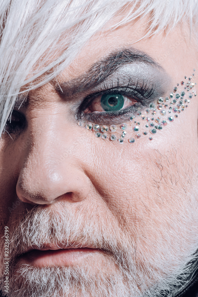 Nature chooses who will be transgender. Fashion male eye makeup.  Transgender man wear eyeshadows and eyebrow makeup. Male makeup look.  Fashion is part of our culture Stock Photo | Adobe Stock