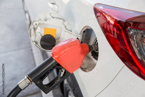 Refill and filling Oil Gas Fuel at station.Gas station - refueling.To fill the machine with fuel. Car fill with gasoline at a gas station. Gas station pump.