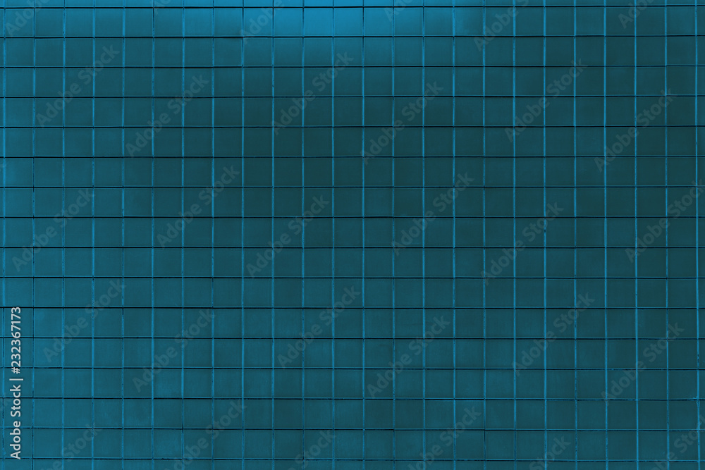 Blaue Wand oder Fassade mit quadratischen kleinen Fliesen nutzbar als dekorativer Hintergrund oder Textur.
Blaue Wand oder Fassade mit quadratischen kleinen Fliesen nutzbar als dekorativer Hintergrund oder Textur.