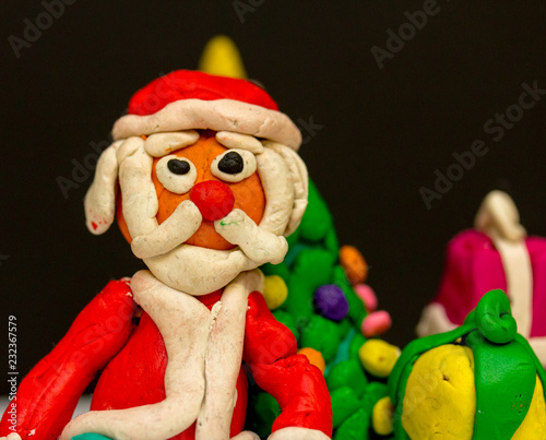 plasticine Santa Claus wishes everyone good luck!