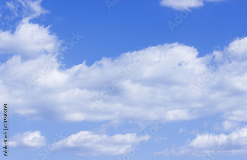 Blue sky white clouds background.