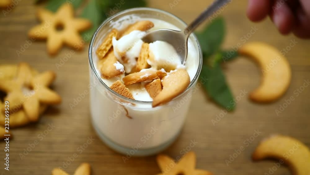 sweet homemade yogurt with cookies in a glass cup sweet homemade yogurt with cookies in a glass cup