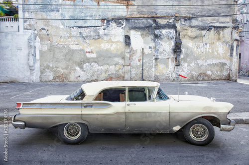 A grey and green American car still running on the streets of Cuba. © Tjeerd