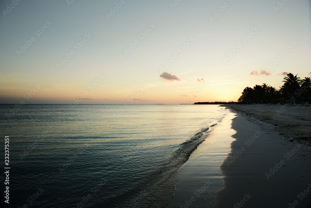 Sunset on the beautiful white sand beach of Cayo Levisa, Cuba