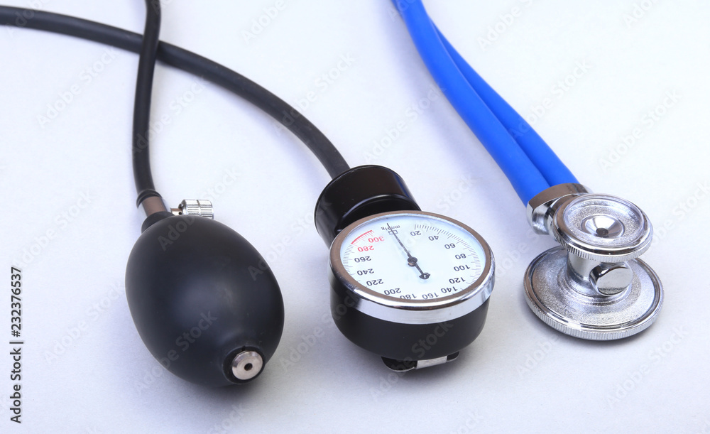 Medical stethoscope and blood pressure meter isolated on white background. healthcare. Medical stethoscope and blood pressure meter isolated on white background. healthcare.