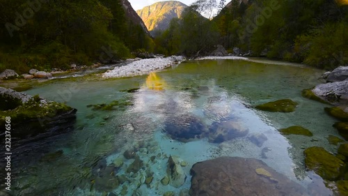Emerald water in unspoiled Soca river,Slovenia