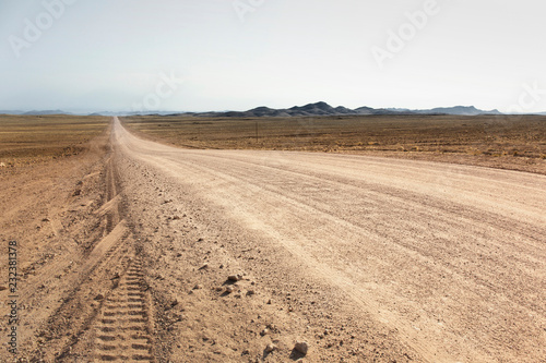 Gravel road to the Fish River Canyon, south of Namibia, Africa. Dry season