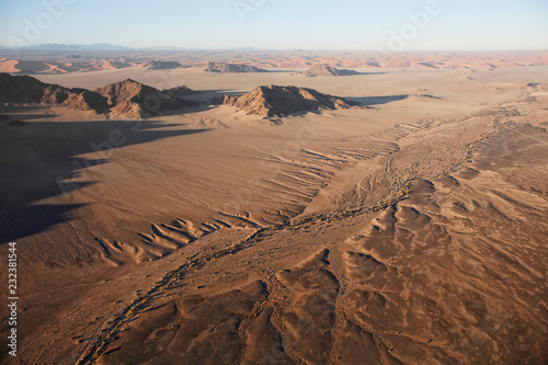 Hot air balloons landing on the sands of the Sossusvlei Desert, Sesriem, Namibia