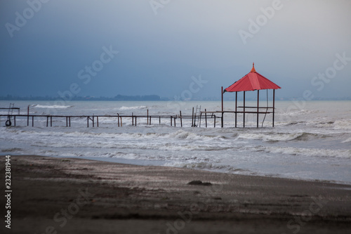 Gisoom Beach, Talesh, Iran. .Fishermen see footbridge or jetty at the beach. The Caspian Sea is the largest enclosed inland body of water on Earth by area. photo