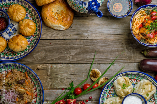 dishes of Uzbek cuisine lagman, pilaf, manti photo