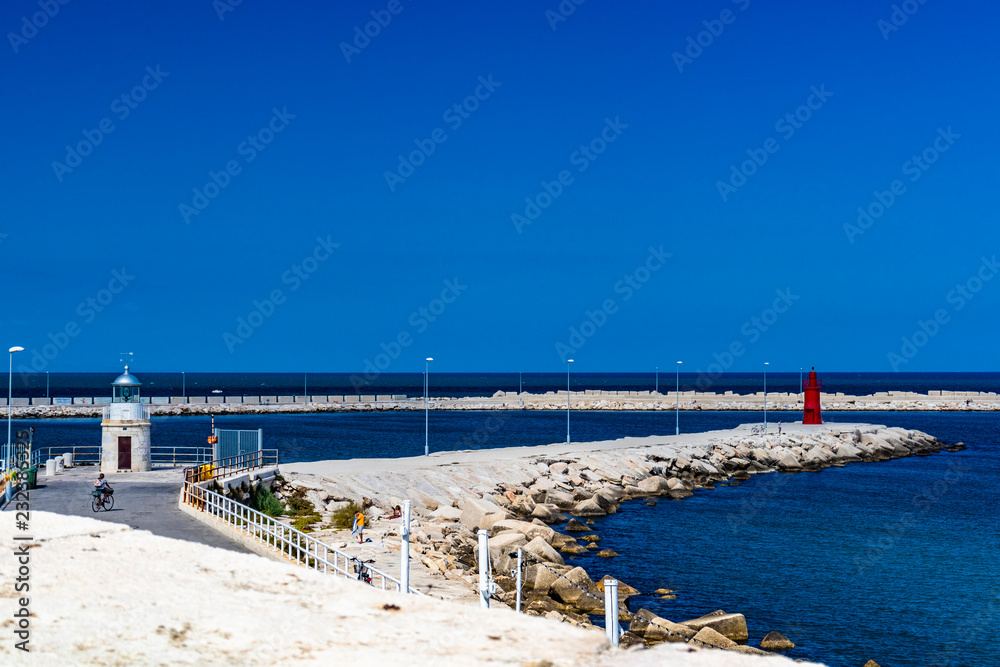 beautiful view of the sea and the port of Trani. Blue sky and sea. In Puglia, near Bari, Barletta, Andria.