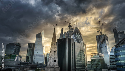 Desaturated aerial view of skyscrapers of the world famous bank district of central London after dusk