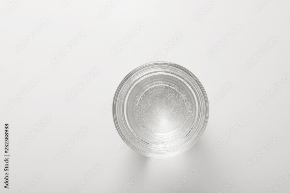 Glass of fresh water on white background, top view Glass of fresh water on white background, top view