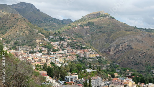 Taormina, Province of Messina, Sicily. View of part of the city, built on the hillside. Taormina was founded in the 4th century BC and is one of Sicily's most popular summer destinations. © from_south