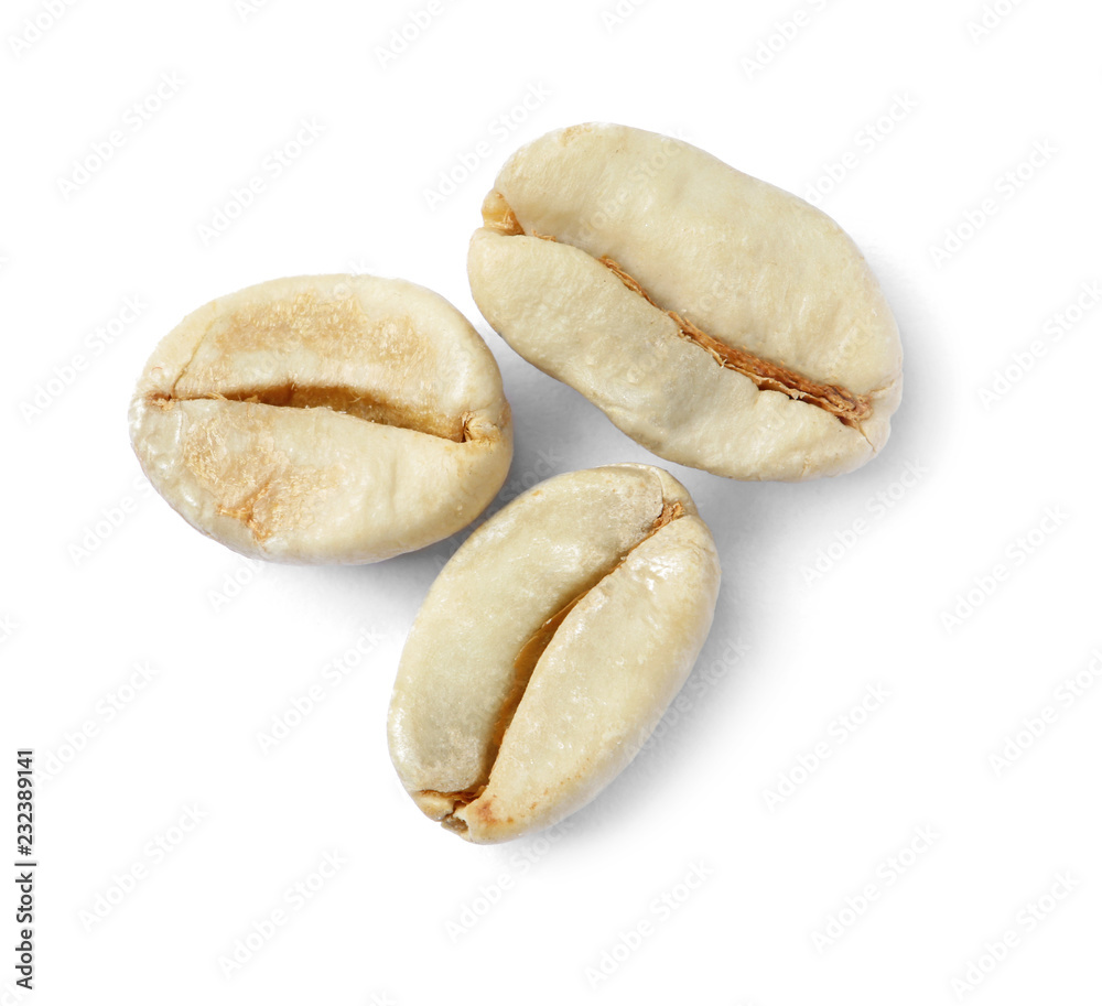 Green coffee beans on white background, top view Green coffee beans on white background, top view