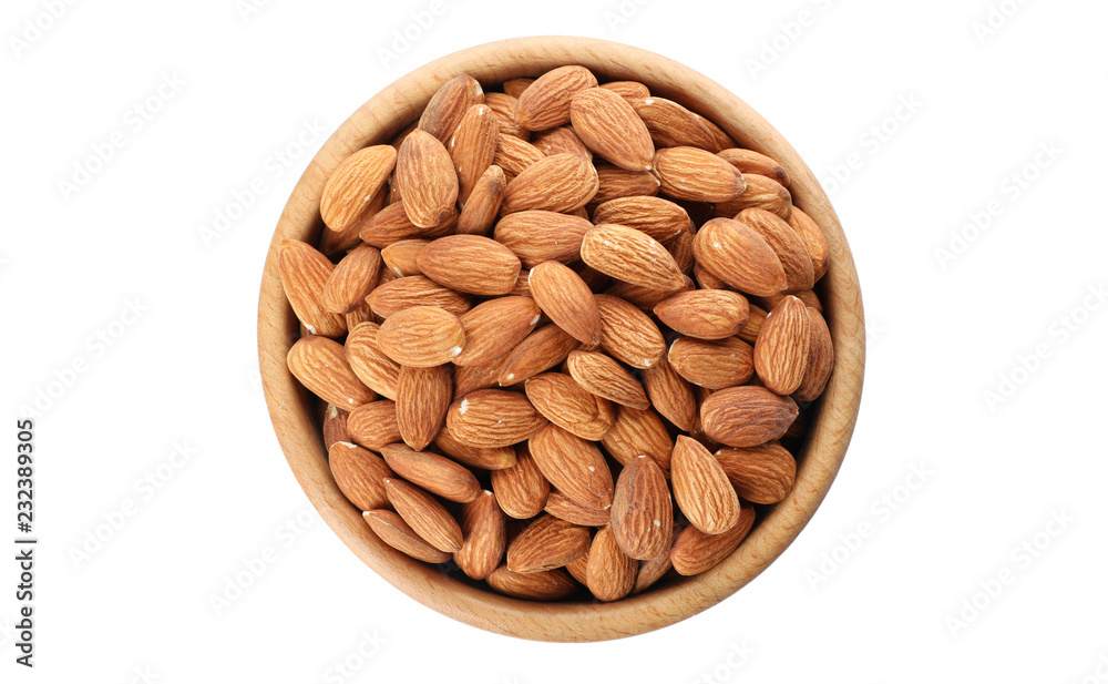 Bowl with organic almond nuts on white background, top view