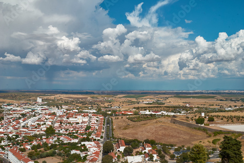 White clouds over Portuguese village photo