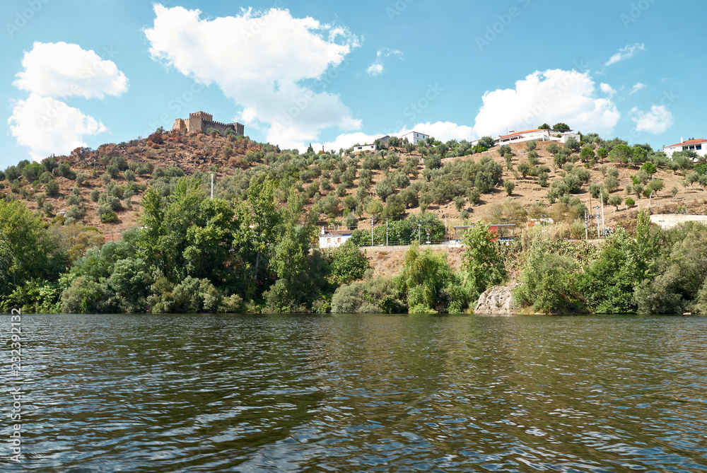 castle on river shore