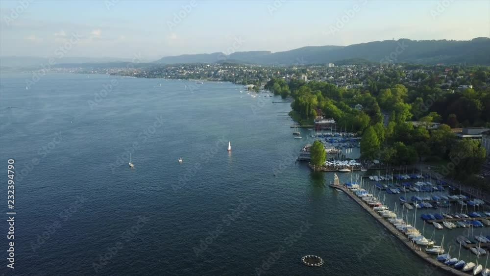 sunset time zurich city lakeside dock aerial panorama 4k switzerland
sunset time zurich city lakeside dock aerial panorama 4k switzerland