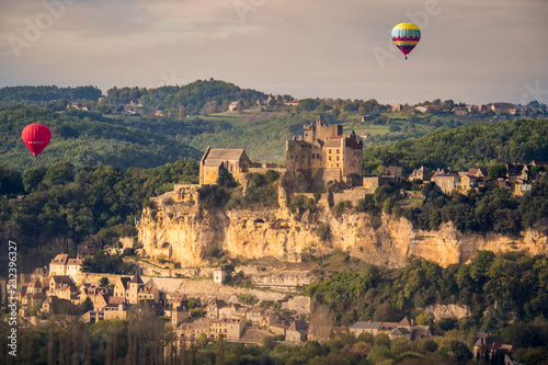 Hot Air Balloons Flying Over Beynac in the Dordogne Valley. France