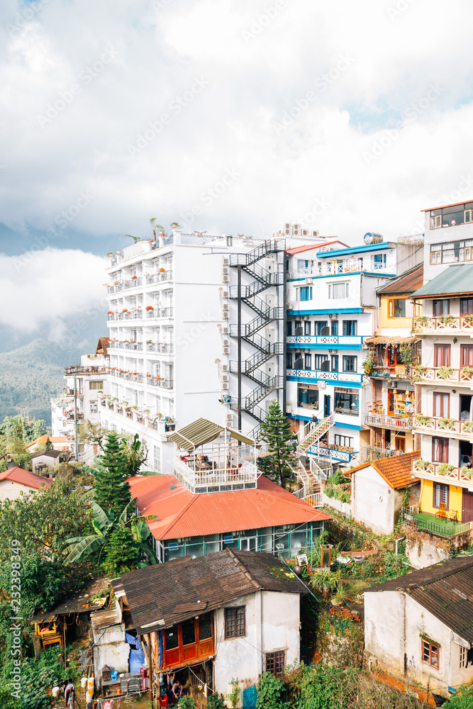 Hotel buildings and mountain with cloud in Sapa, Vietnam