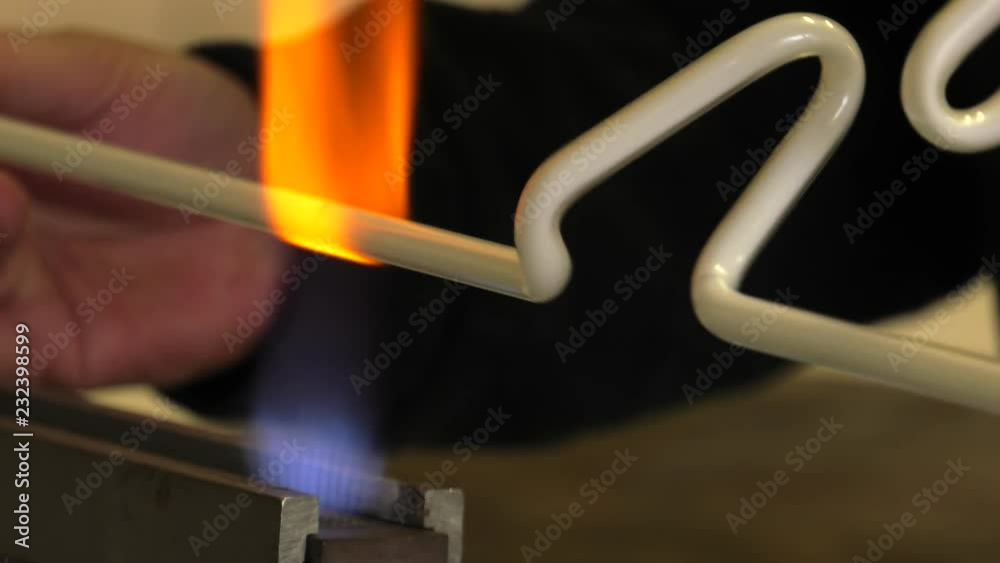 Male Hands Making neon lightbulbs. Hand Welding Glass Tubes. 4K, UHD, 50p, Cinematic,Close-up, Male Hands Making neon lightbulbs. Hand Welding Glass Tubes. 4K, UHD, 50p, Cinematic,Close-up,
