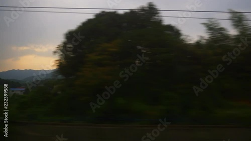 sunset sky wuhan shenzhen train road trip side window pov panorama 4k china
 photo