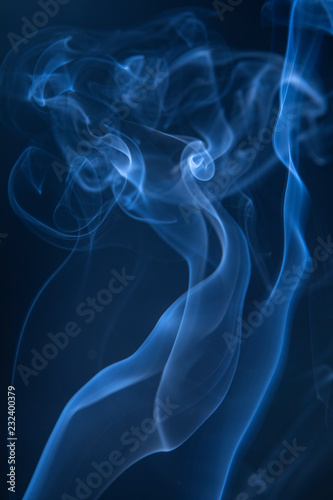 Abstract blue smoke swirls