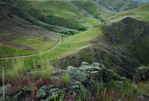 The hells canyon along the imnaha river and a winding road photo